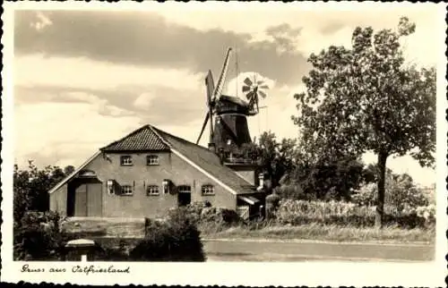 Ak Ostfriesland, Blick auf eine Windmühle