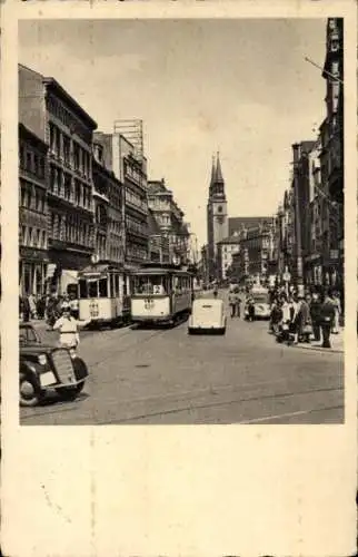 Ak Magdeburg an der Elbe, Breiter Weg, Straßenbahn Linie 1 u. 2, Verkehrspolizist, Autos, Kirche