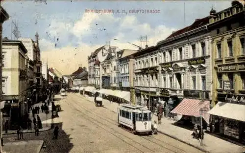 Ak Brandenburg an der Havel, Hauptstraße, Straßenbahn, Geschäfte