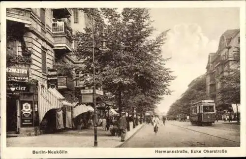 Ak Berlin Neukölln, Hermannstraße Ecke Okerstraße, Geschäft Pelzwaren, Straßenbahn