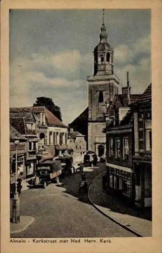 Ak Almelo Overijssel Niederlande, Kerkstraat met Ned. Herv. Kerk