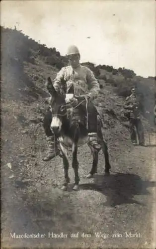 Ak Mazedonischer Händler auf dem Wege zum Markt, Esel