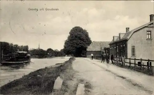 Ak Gouderak Südholland, Straße, Passanten, Fluss