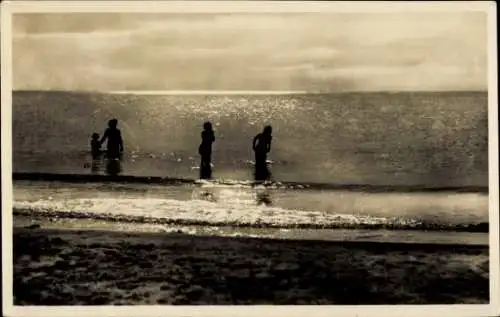 Ak Ostseebad Zingst, Strand, Menschen im Wasser