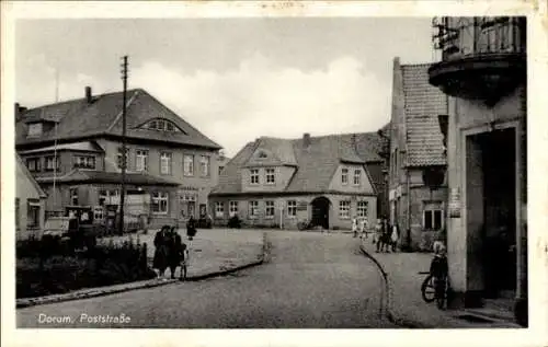 Ak Dorum Wurster Nordseeküste, Poststraße, Drogerie, Passanten, Häuserfassaden