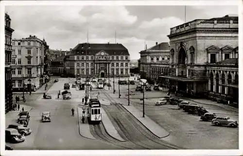 Ak Mannheim in Baden, Straßenbahn am Mannheimer Hauptbahnhof, rechts das ehemalige Kaufhaus M....