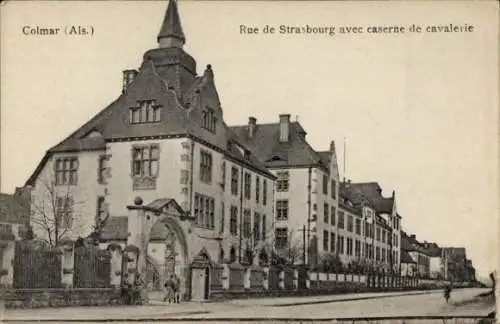 Ak Colmar Kolmar Elsass Haut Rhin,  Rue de Strasbourg mit Kaserne