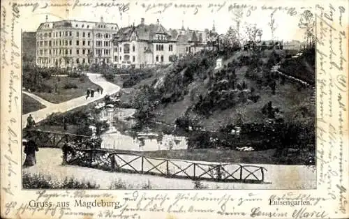 Ak Magdeburg an der Elbe,  Luisenpark, Teich mit Brücke, Gebäude im Hintergrund