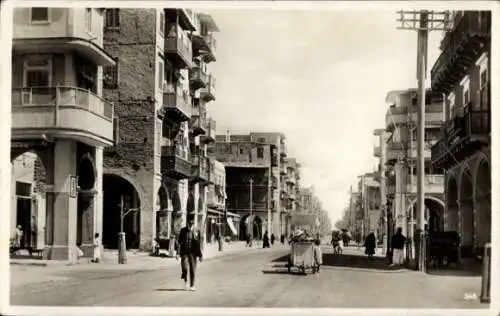 Ak Port Said Ägypten, Straßenpartie, Passanten, Gebäude