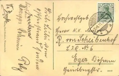 Ak Ostseebad Warnemünde Rostock, Warnemünde Strandpartie, Personen am Strand, im Hintergrund H...