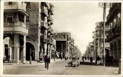 Ak Port Said Ägypten, Straßenpartie, Passanten, Gebäude