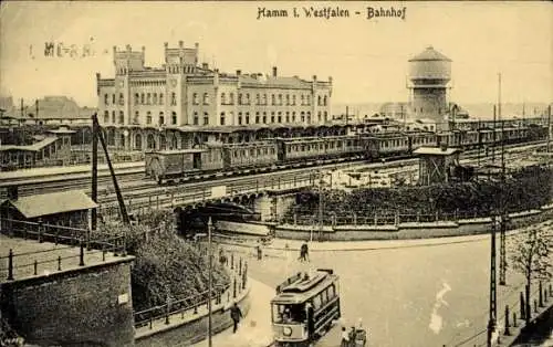 Ak Hamm in Westfalen, Bahnhof, Züge, Wasserreservoir, historische Architektur, Straßenbahn