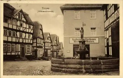 Ak Treysa Schwalmstadt Hessen, Johannesbrunnen, Fachwerkhäuser, Werbung für Lebensmittelladen