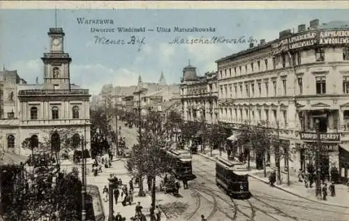 Ak Warszawa Warschau Polen, Marschallkowskastraße, Wiener Bahnhof, Geschäftshäuser, Straßenbahn