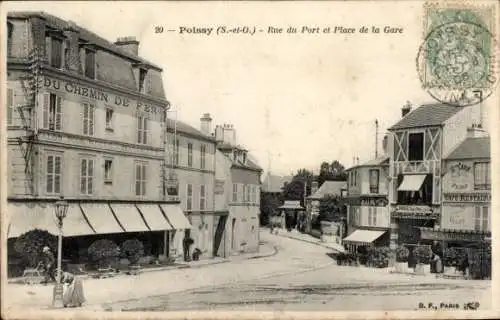 Ak Poissy Yvelines, Straßenszene mit Personen, die vor einem Restaurant stehen. Im Hintergrund...