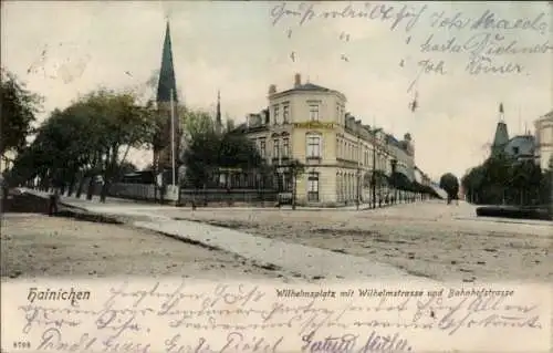 Ak Hainichen in Sachsen, Wilhelmsplatz, Wilhelmstraße, Bahnhofstraße