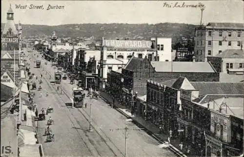 Ak Durban Südafrika, West Street, Straßenpartie, Straßenbahnen, Geschäfte