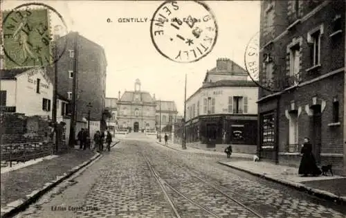 Ak Gentilly Val de Marne, Straße mit Gleisen, Gebäude im Hintergrund, Stadtansicht, historisch