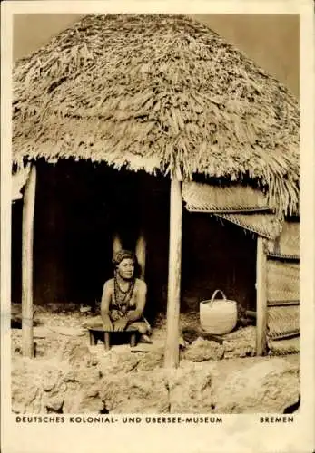 Ak Hansestadt Bremen, Deutsches Kolonial- und Übersee-Museum, Lehmhütte, Mann