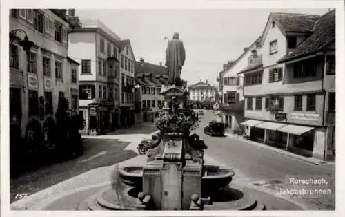 Ak Rorschach Kt. St. Gallen Schweiz, Jakobsbrunnen, Statue, alte Gebäude, Straßenansicht, Schw...