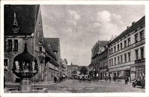 Ak Aschersleben im Salzlandkreis, Straßenansicht mit Brunnen