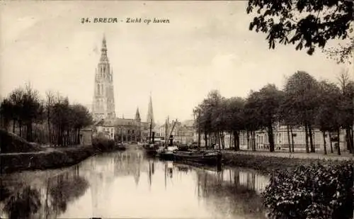 Ak Breda Nordbrabant Niederlande, Blick auf den Hafen von  Kirchturm, Kanal, einige Boote, Kai...