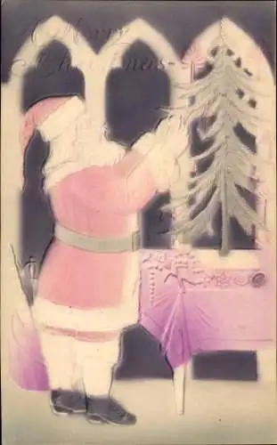 Präge Ak Frohe Weihnachten, Weihnachtsmann schmückt einen Tannenbaum