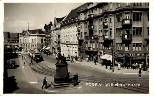 Ak Poznań Posen, Wilhelmstraße, Straßenbahn, Geschäfte