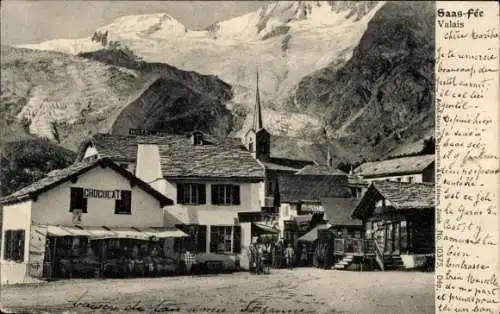 Ak Saas Fee Kanton Wallis, Wohnhäuser, Kirche