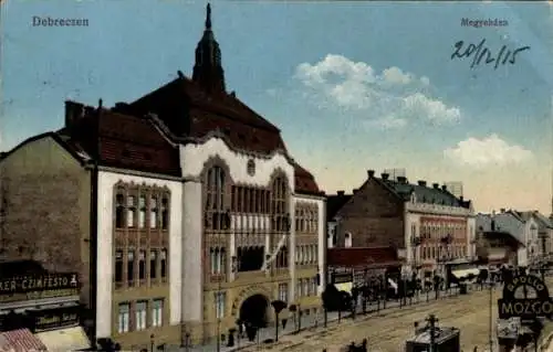 Ak Debreczen Debrecen Debrezin Ungarn, Gebäude mit Turm, Straßenszene, Apollo Kino, Schriftzug...