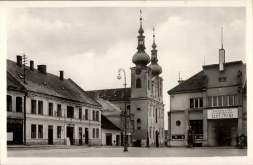 Ak Kojetín Region Olmütz, Stadtansicht, Kirche mit Zwiebeltürmen, historische Architektur, Häuser