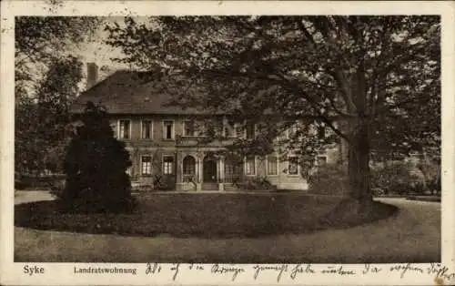 Ak Syke in Niedersachsen, Landratswohnung, Gebäude mit Garten, Bäume, historische Architektur