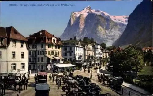 Ak Grindelwald Kanton Bern, Bahnhofplatz, Wetterhorn