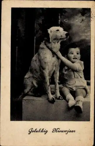 Ak Frohes Neujahr, Kleinkind mit Hund