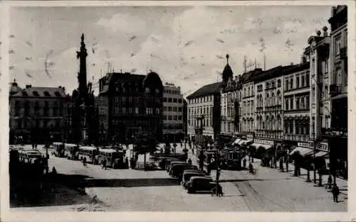 Ak Olomouc Olmütz Stadt, Stadtansicht, Platz mit Monument, historische Gebäude, Straßenverkehr