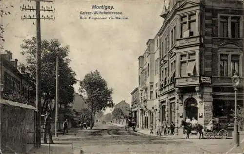 Ak Montigny le Bretonneux Yvelines,  Kaiser-Wilhelmstrasse, historische Gebäude, Pferdewagen, ...