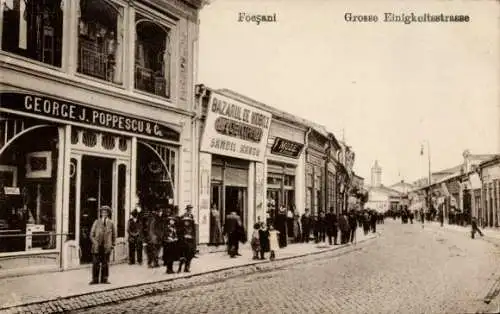 Ak Focșani Fokschan Rumänien, Große Kinigkeitsstraße, Geschäft, Inh. George J. Poppescu