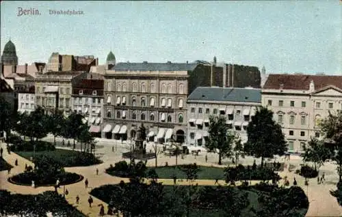 Ak Berlin, Parkanlage auf dem Dönhofplatz, Geschäfte, Denkmal