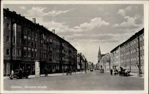 Ak Dessau in Sachsen Anhalt, Zerbsterstraße, Stadtansicht mit Gebäuden und Kirchturm, Wolken