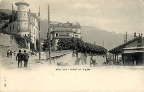 Ak Montreux Kanton Waadt Schweiz, Hôtel de la gare, Terminus, Straße mit Personen, Berge im Hi...