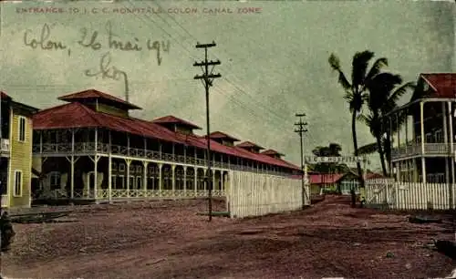 Ak Colón Panama, Eingang zu 1. C. C. Hospitals, Koloniale Architektur, Palmen, Stromleitungen