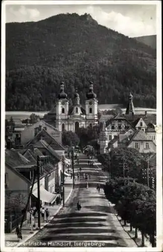 Ak Hejnice Haindorf Reg. Reichenberg, Strassenansicht, Kirche