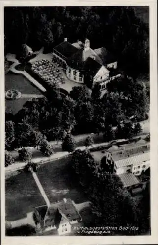 Ak Bad Tölz in Oberbayern, Kurhausgaststätten Bad Tölz vom Flugzeug aus