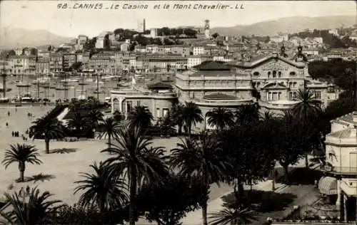 Ak Cannes Alpes Maritimes,  Casino, Mont Chevalier, Palmen, Steilküste, Hafen, Gebäude