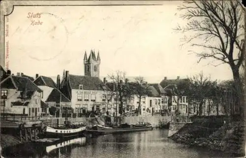 Ak Terneuzen Zeeland Niederlande, Stadtansicht von  Häuser, Wasserweg, Boote, Kirche