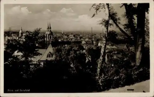 Ak Bielefeld in Nordrhein Westfalen, Blick auf  Stadtansicht, historische Gebäude, Bäume im Vo...