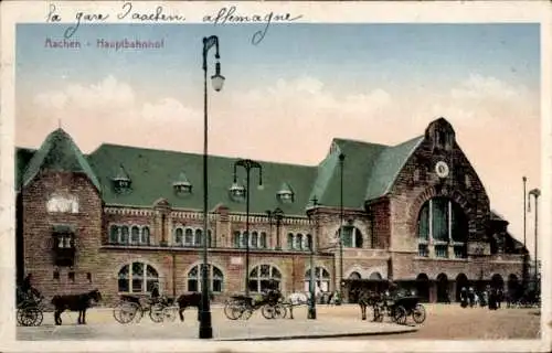 Ak Aachen, Aachen Hauptbahnhof, Bahnhofgebäude, Pferdekutschen, historische Postkarte