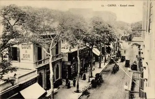 Ak Cairo Kairo Ägypten, Kamelstraße, Geschäfte, Straßenansicht, historische Postkarte