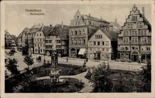 Ak Paderborn in Westfalen, Vorderseite: Marienplatz, historische Gebäude, Brunnen, Bäume, Stra...