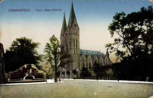 Ak Osnabrück in Niedersachsen, Herz Jesu-Kirche, historisches Gebäude, Bäume, Platz